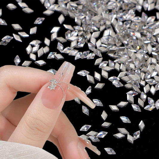 150Pcs Mini Rhombic Nail Charms Shiny Zircon Nail Rhinestones for Nails 3D Bling Silver Nail Charms Nail Jewelry Gemstones Nail Gems Nail Diamonds Flatback Rhinestones for Women Acrylic Nail Crafting